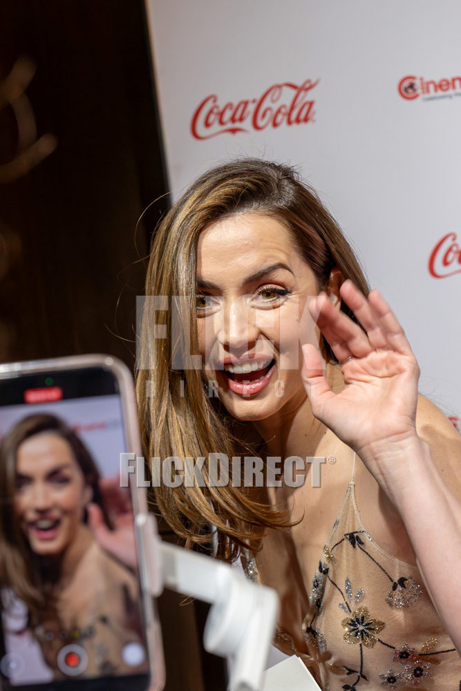 Ana de Armas waving to the audience during CinemaCon 2025 in Las Vegas